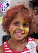 sofia with rainbow face paint