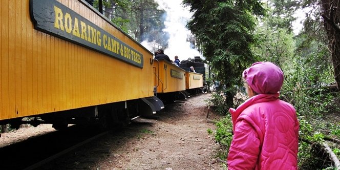 CLICK to continue: Sofia looking up at the train and carriages