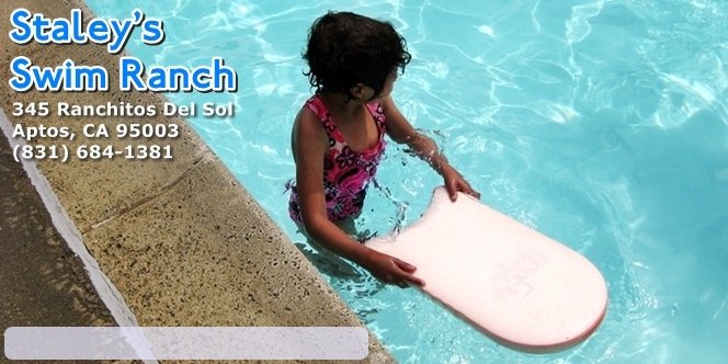 CLICK to continue: Sofia in the pool with kick board